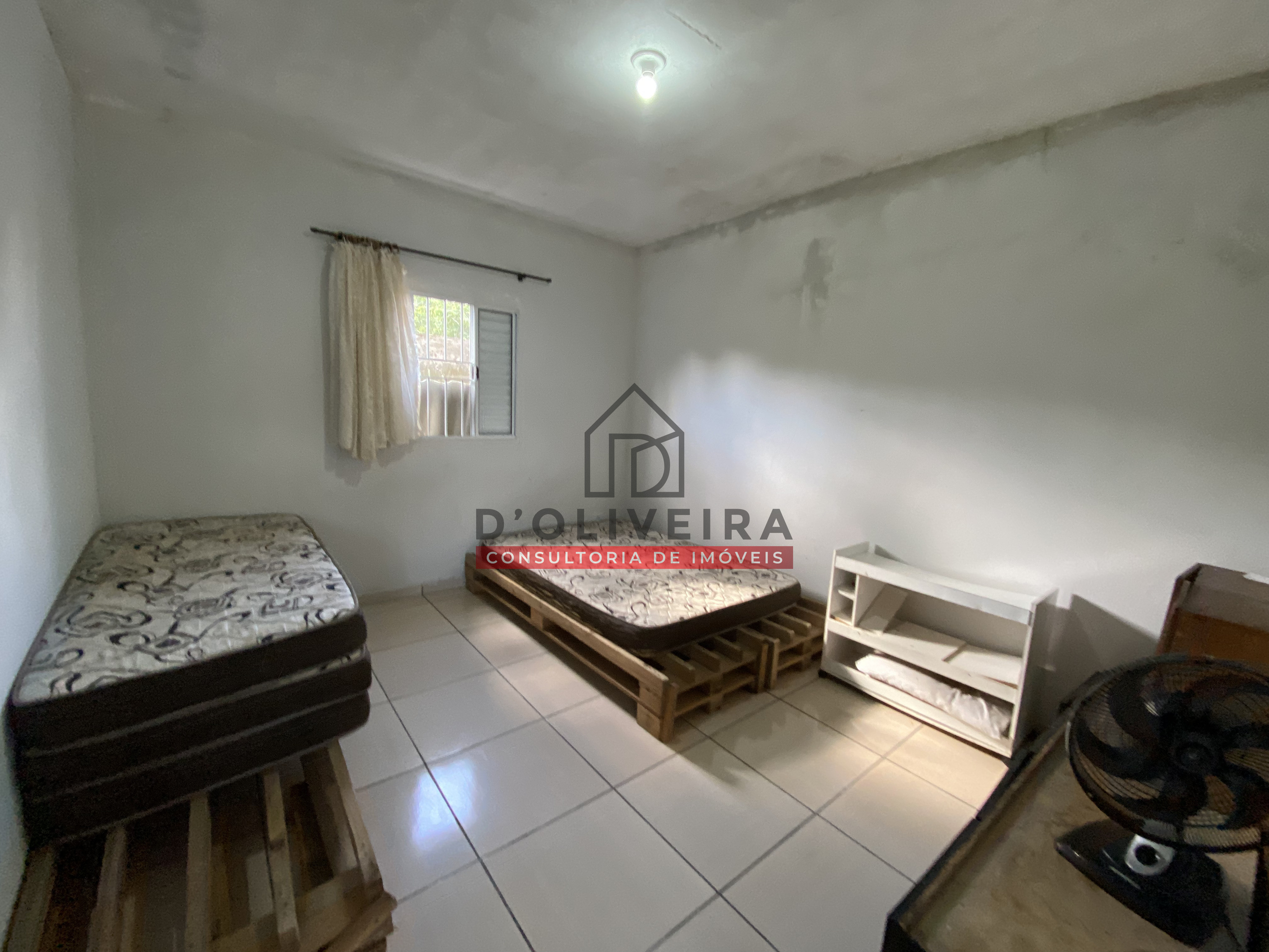 Casa com piscina e churrasqueira à venda na Vila Peruíbe - Peruíbe - SP