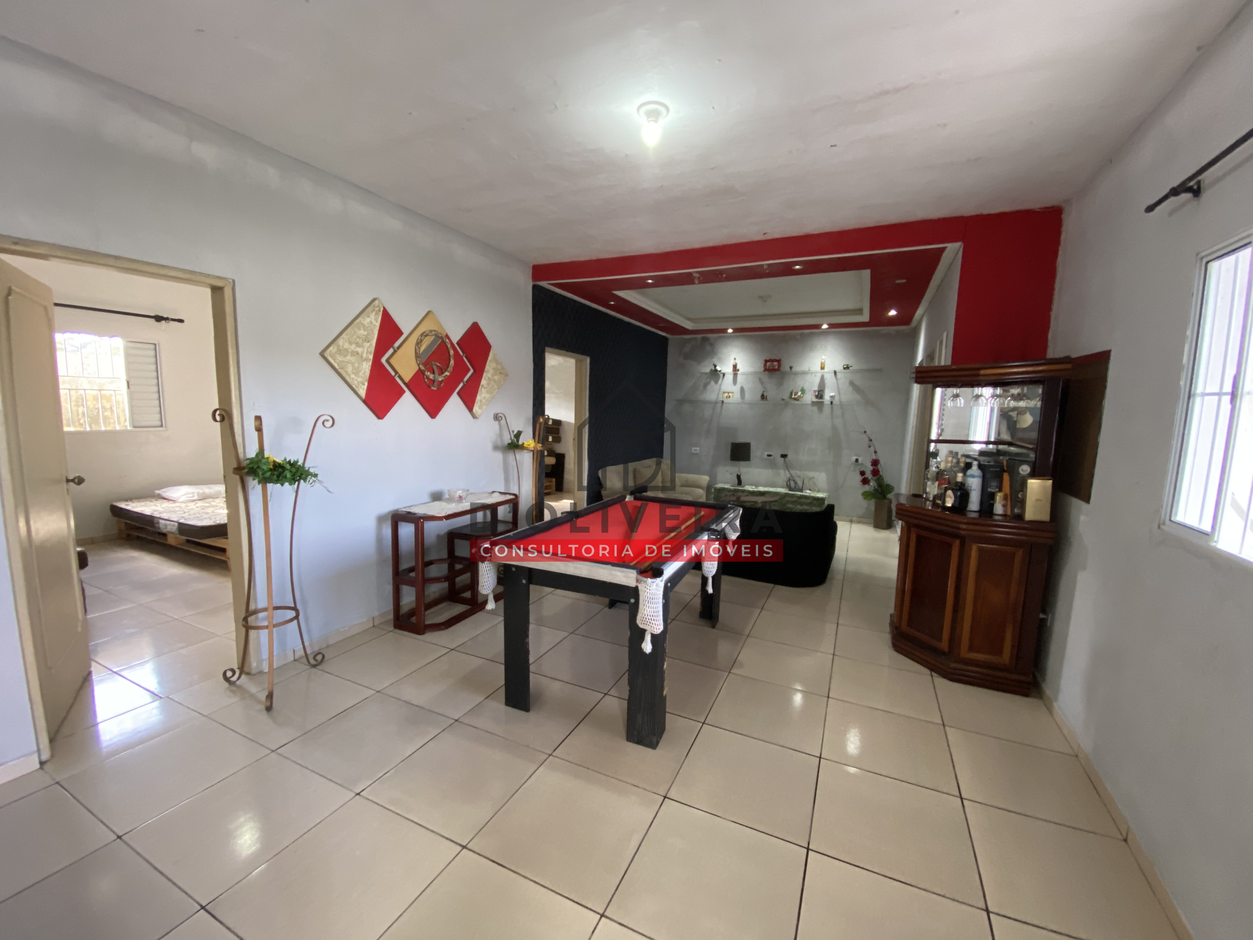 Casa com piscina e churrasqueira à venda na Vila Peruíbe - Peruíbe - SP