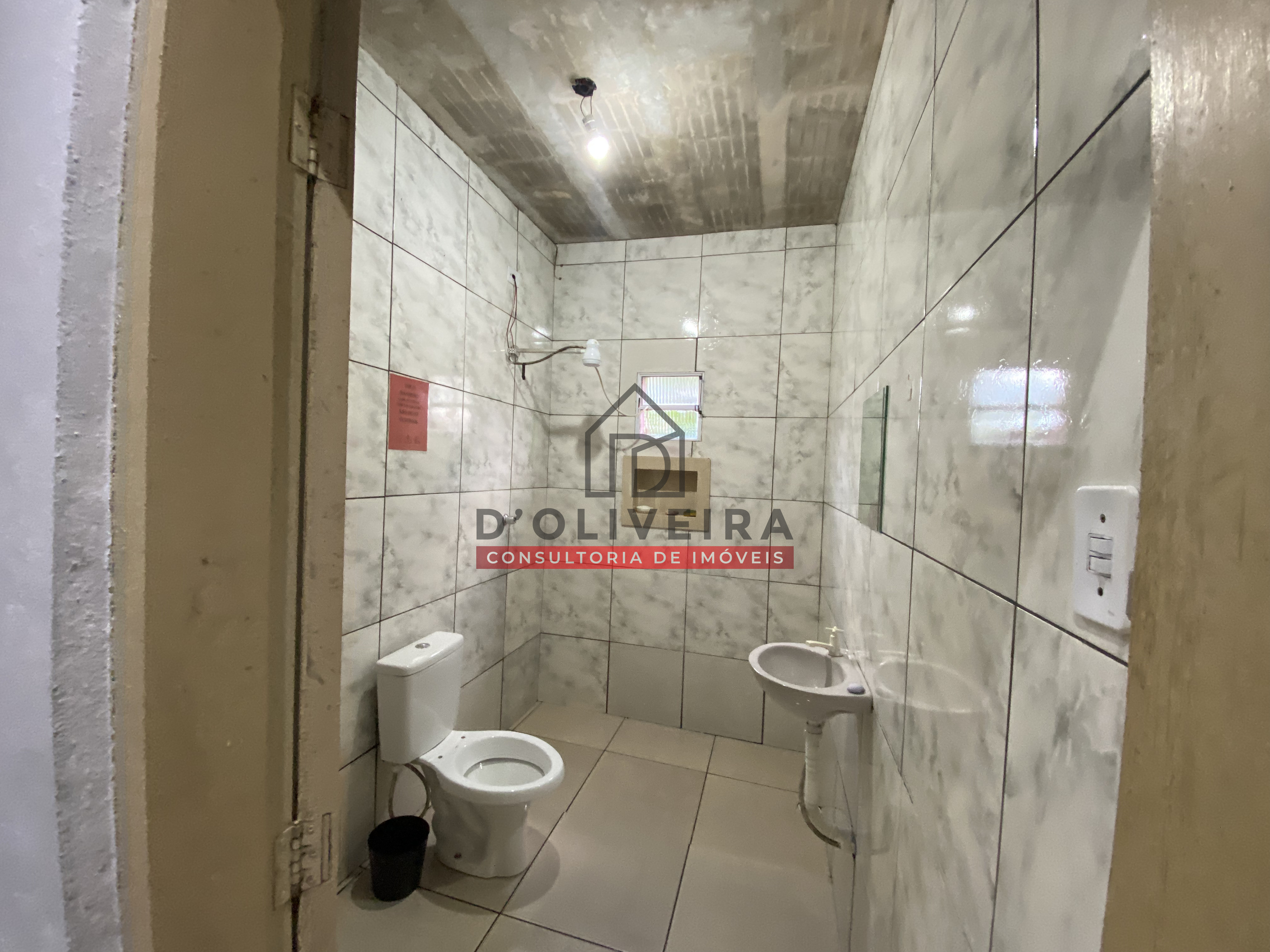 Casa com piscina e churrasqueira à venda na Vila Peruíbe - Peruíbe - SP