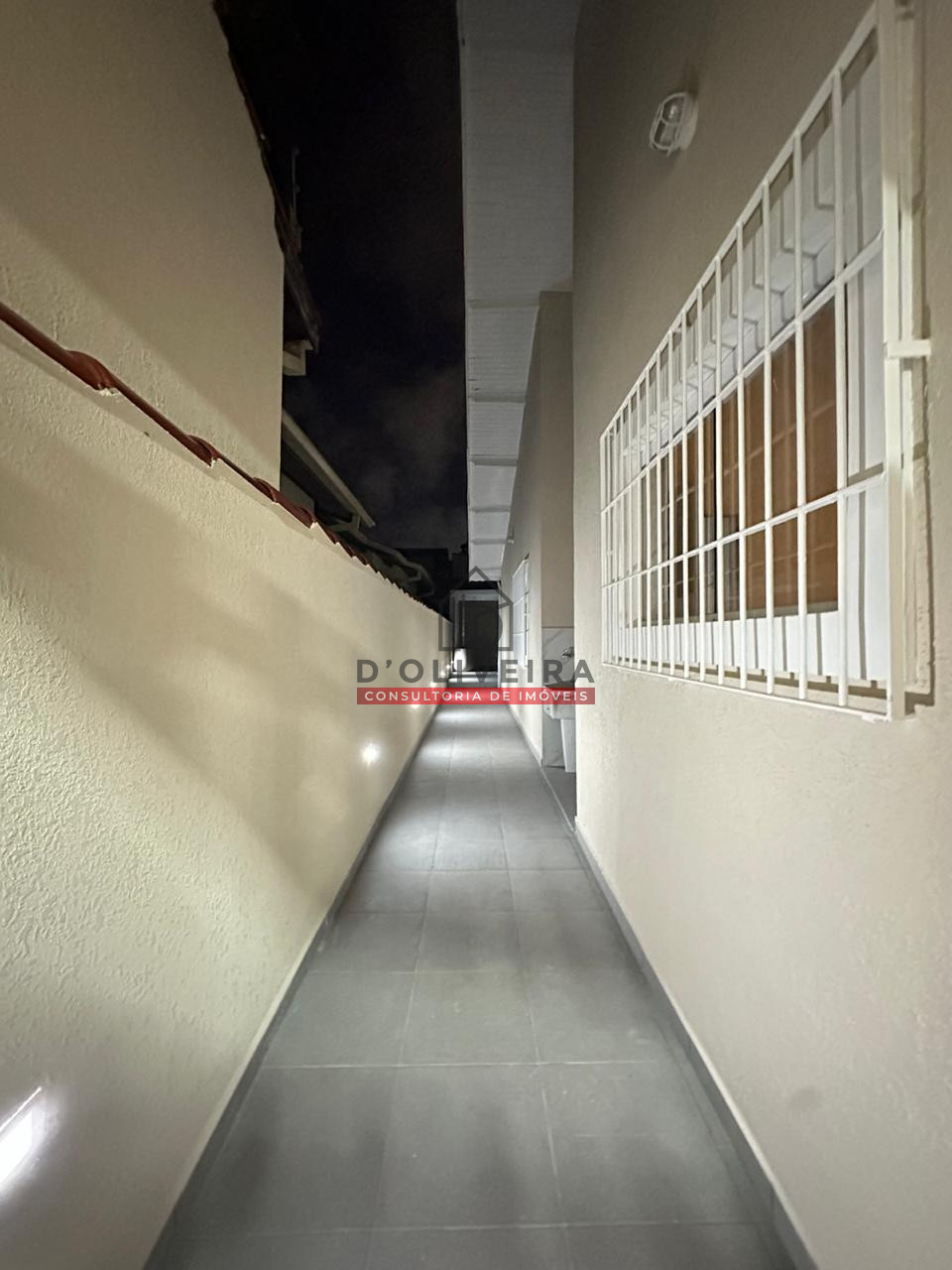 Casa geminada com piscina a venda no Bairro Stella Maris - Peruíbe - SP