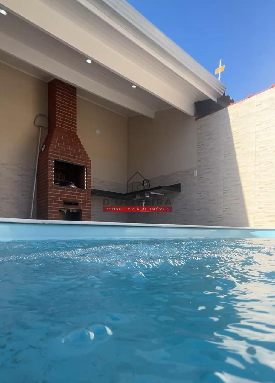 Casa geminada com piscina a venda no Bairro Stella Maris - Peruíbe - SP