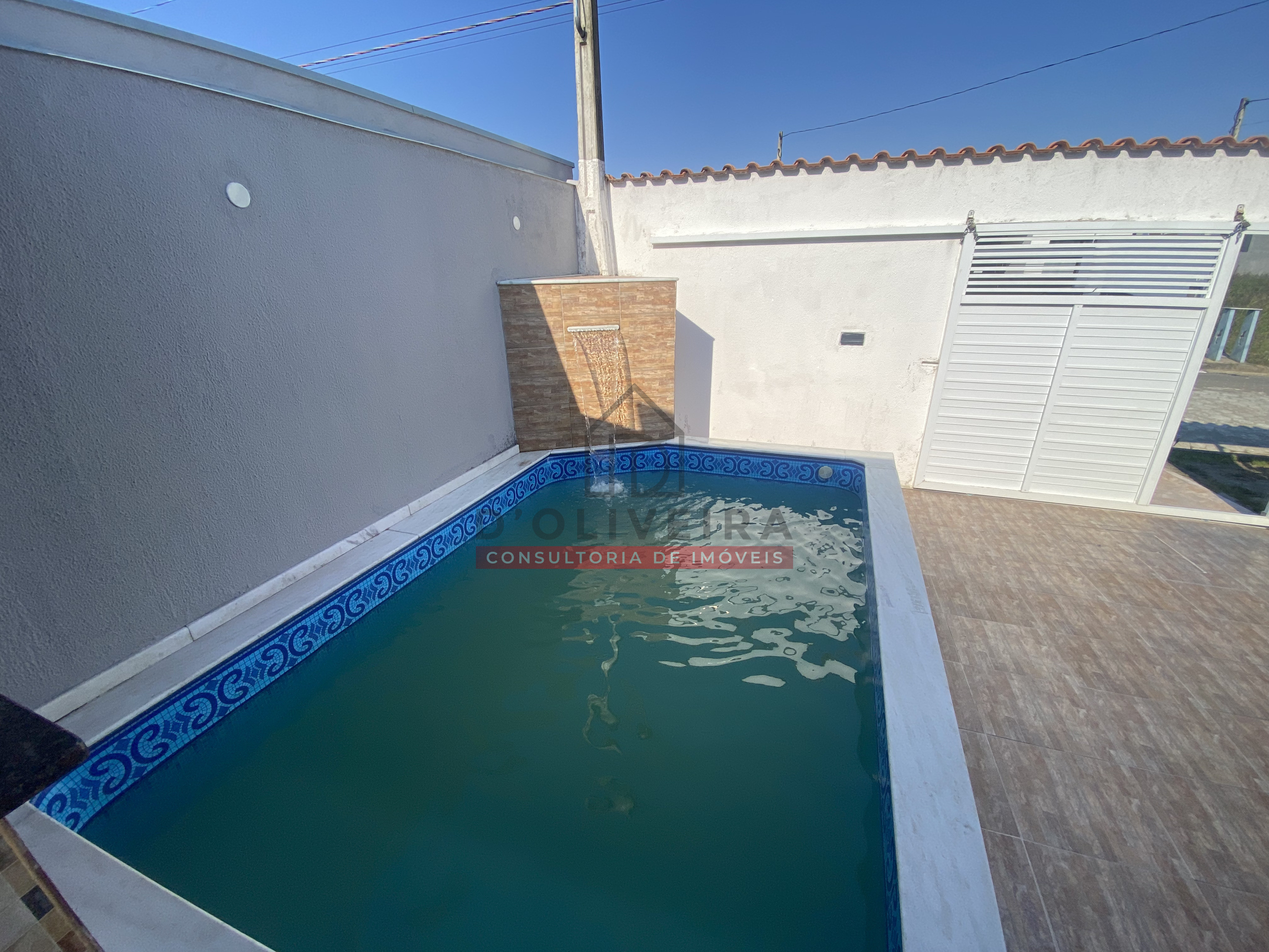 Casa geminada com piscina à venda no Flora Rica 2 - Peruíbe - SP