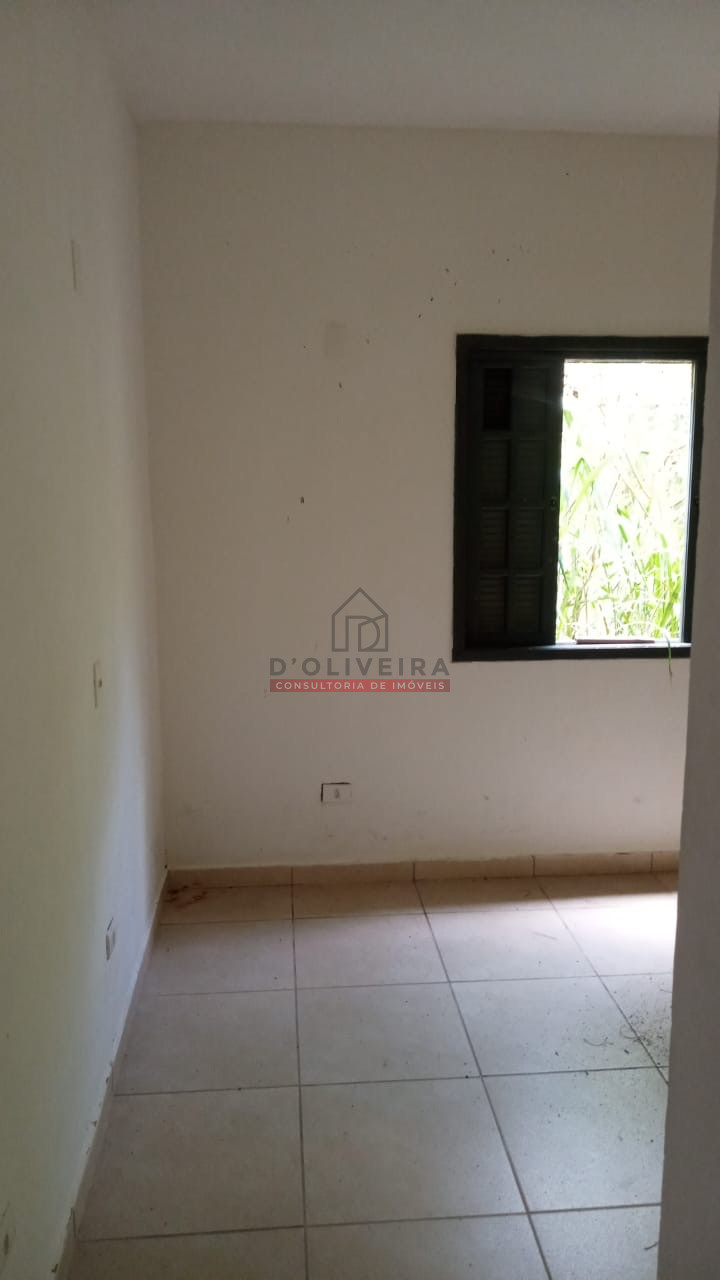 Casa térrea geminada a venda no Bairro Jardim Marcia - Peruíbe - SP