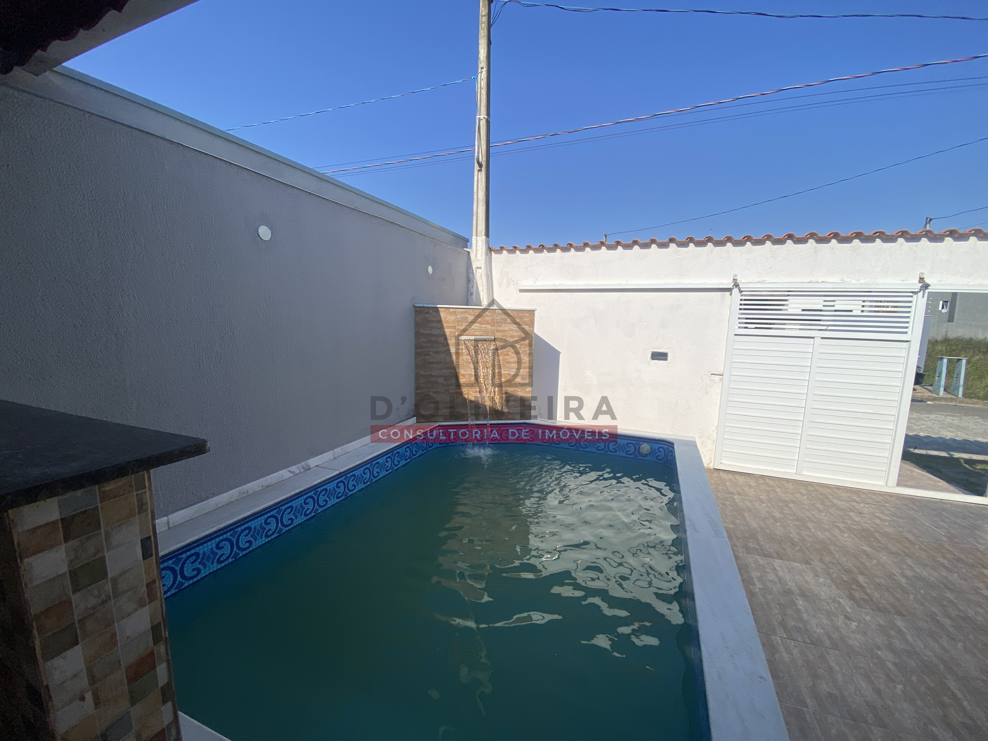 Casa geminada com piscina à venda no Flora Rica 2 - Peruíbe - SP