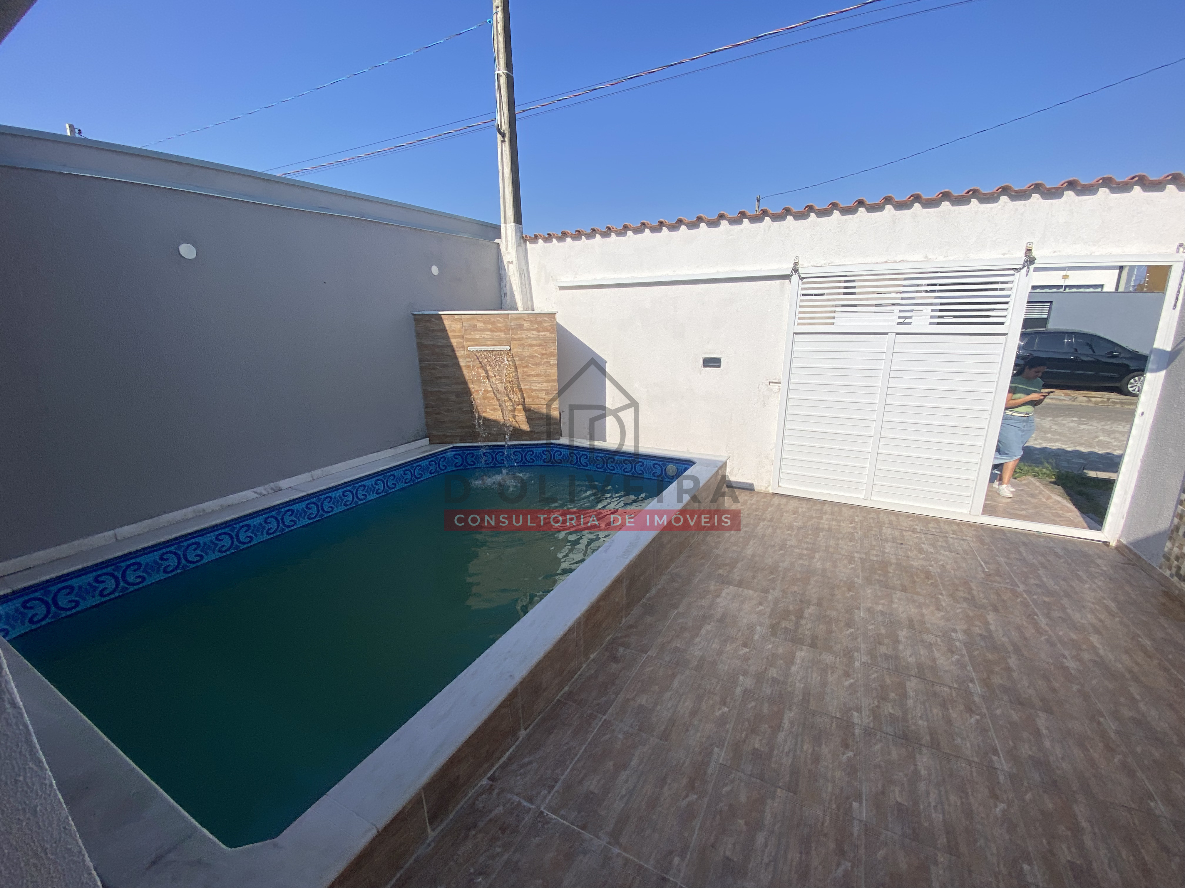 Casa geminada com piscina à venda no Flora Rica 2 - Peruíbe - SP