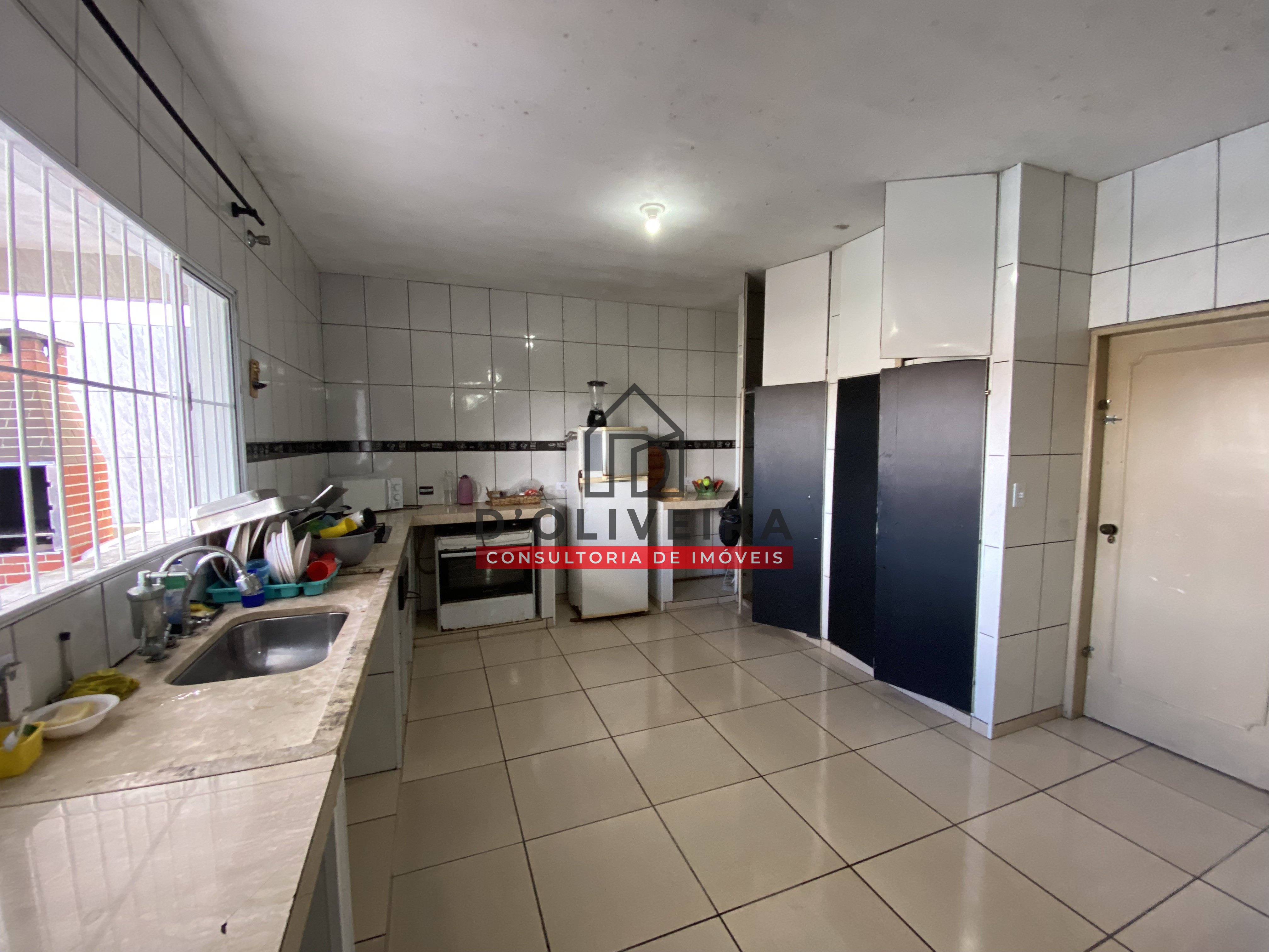 Casa com piscina e churrasqueira à venda na Vila Peruíbe - Peruíbe - SP