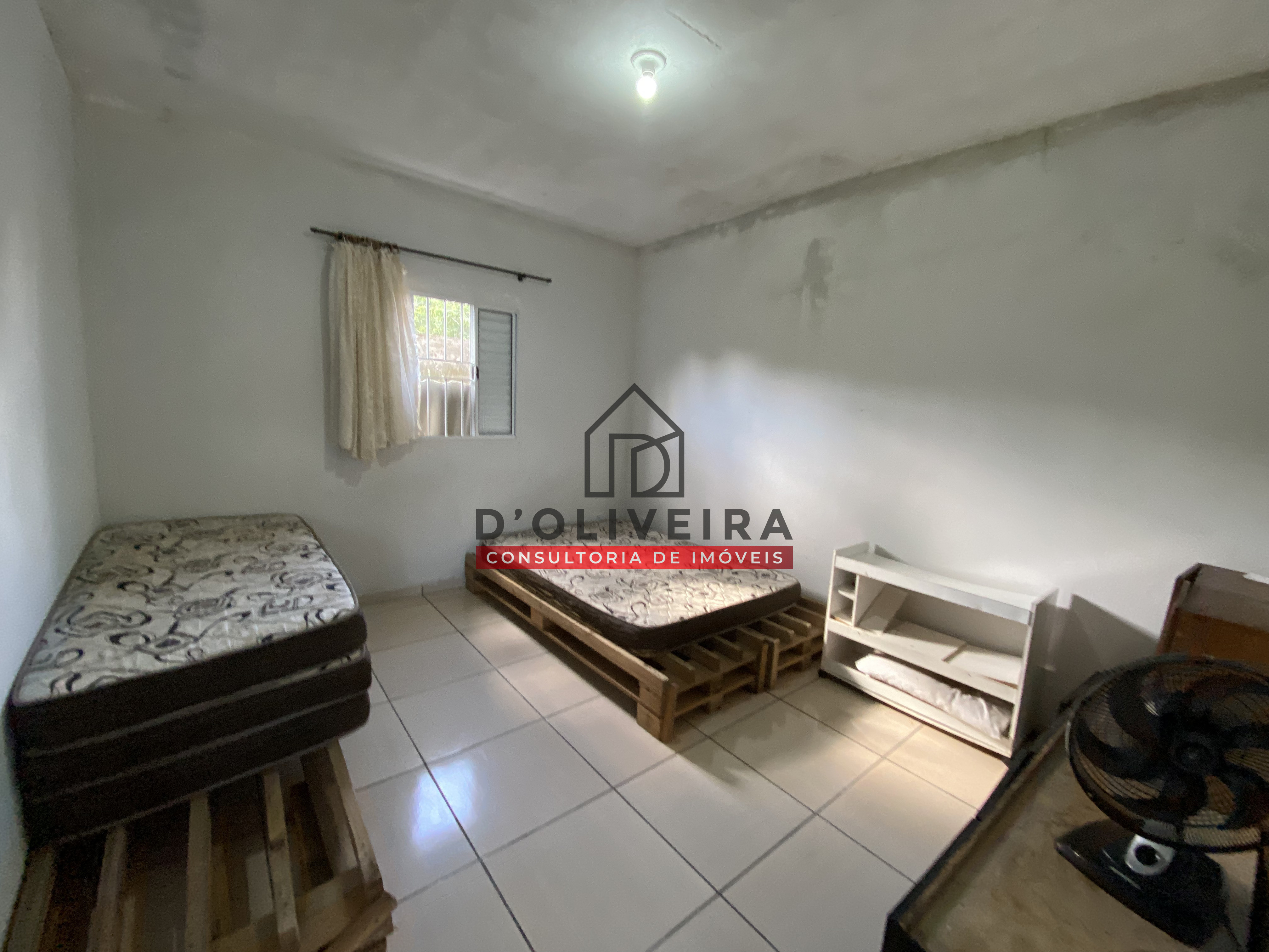 Casa com piscina e churrasqueira à venda na Vila Peruíbe - Peruíbe - SP