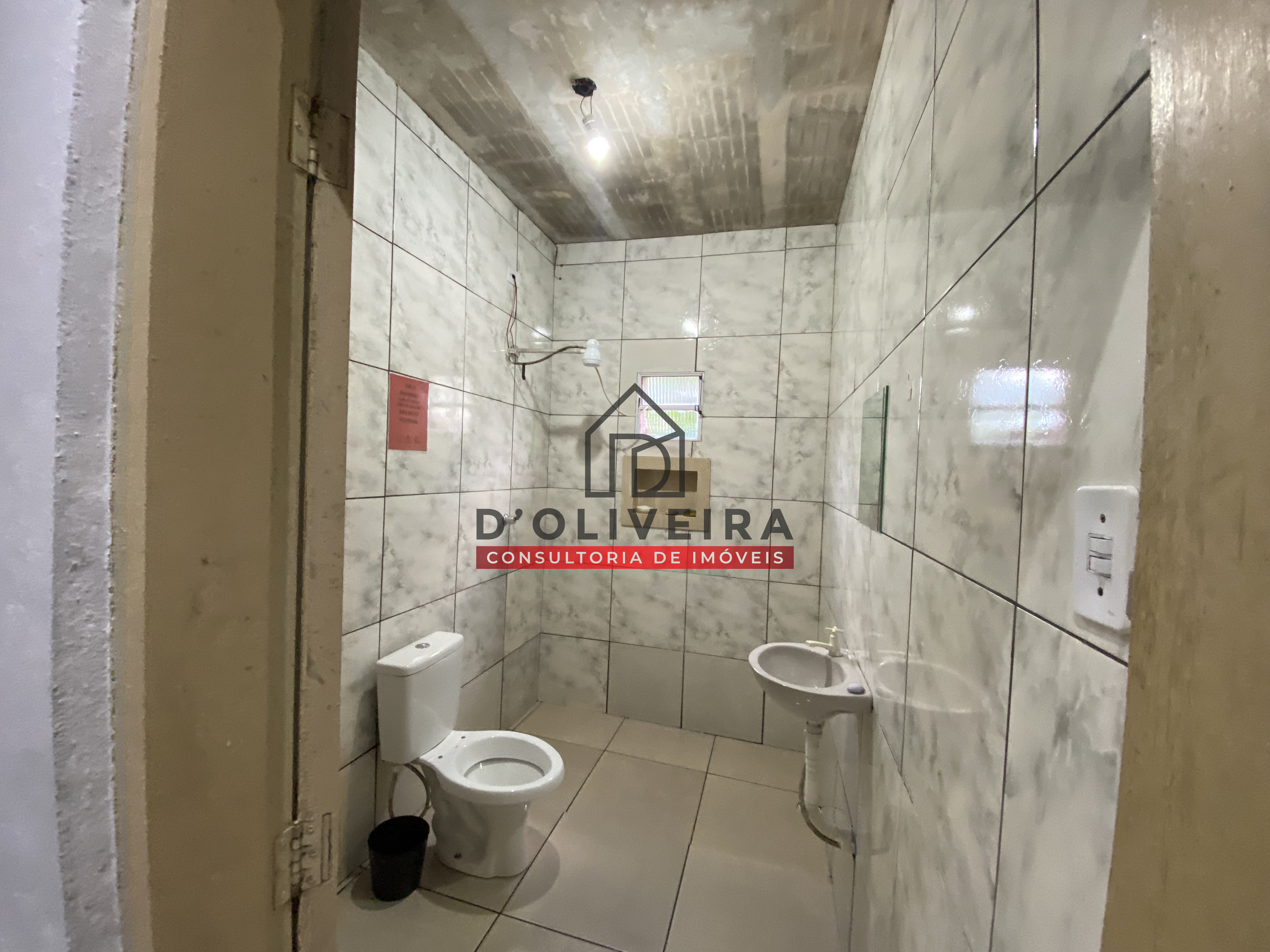 Casa com piscina e churrasqueira à venda na Vila Peruíbe - Peruíbe - SP