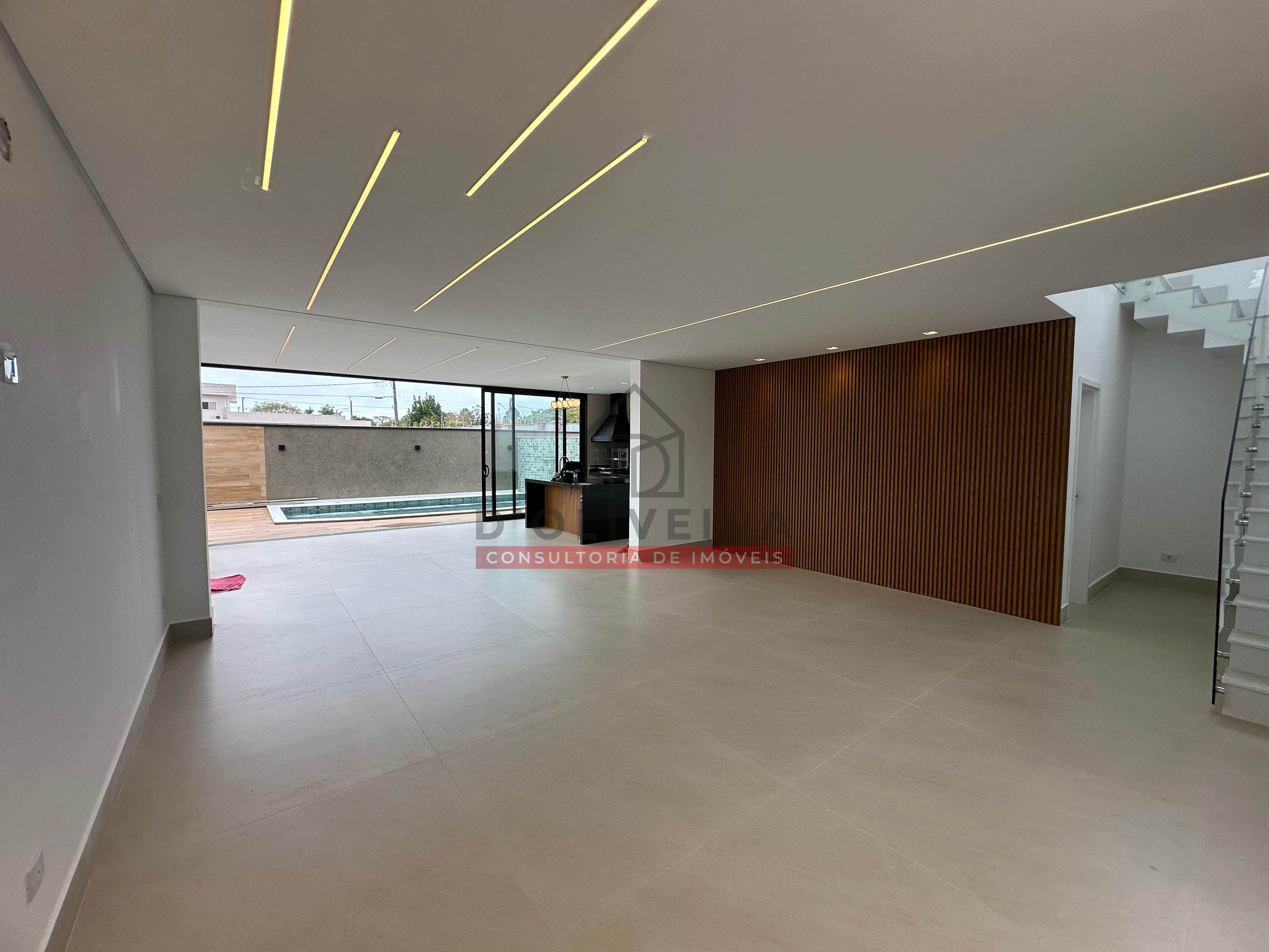 Sobrado moderno com piscina e churrasqueira no condomínio Flora Rica - Peruíbe - SP