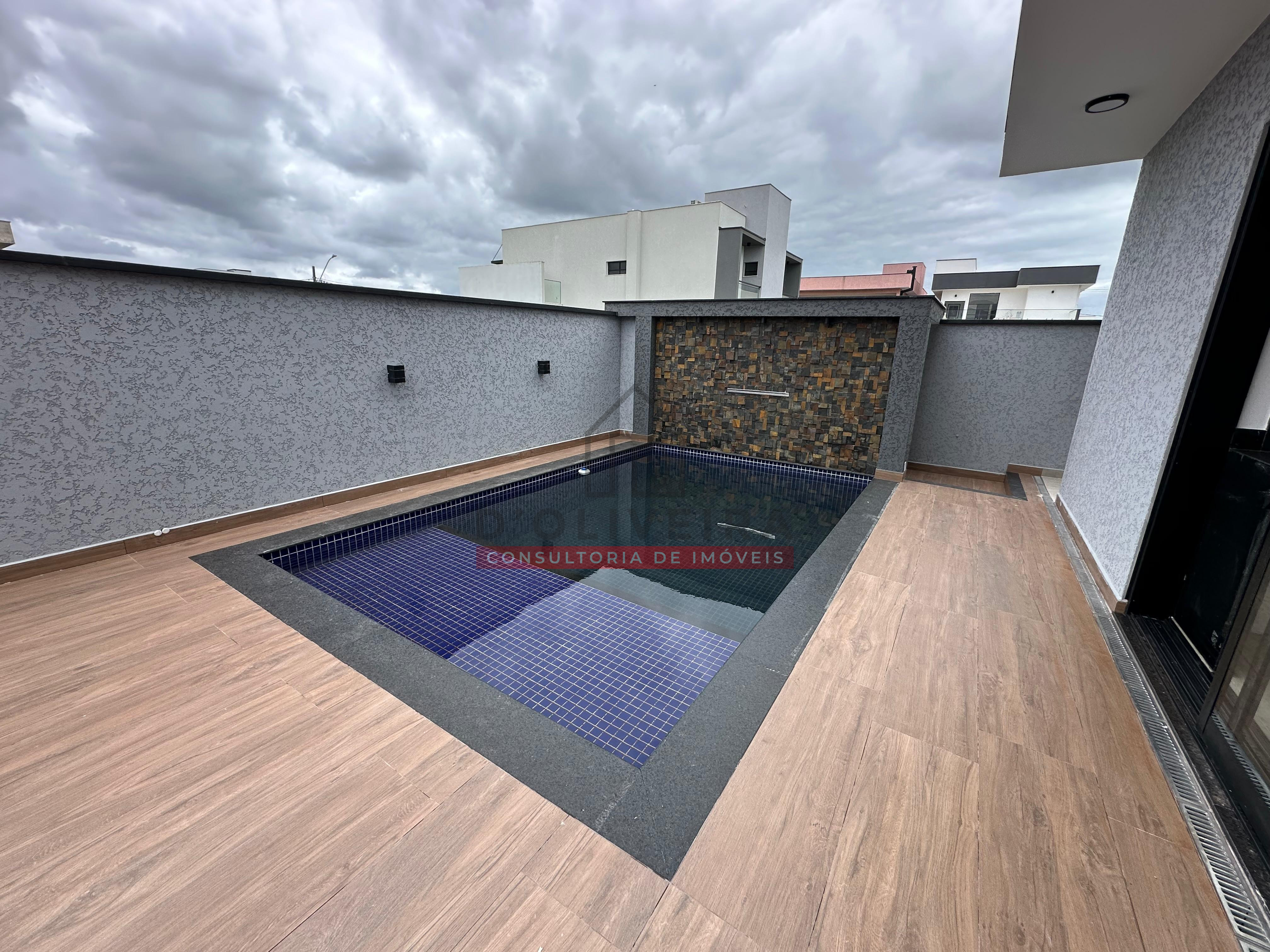 Sobrado com piscina e churrasqueira no condomínio Flora Rica - Peruíbe - SP