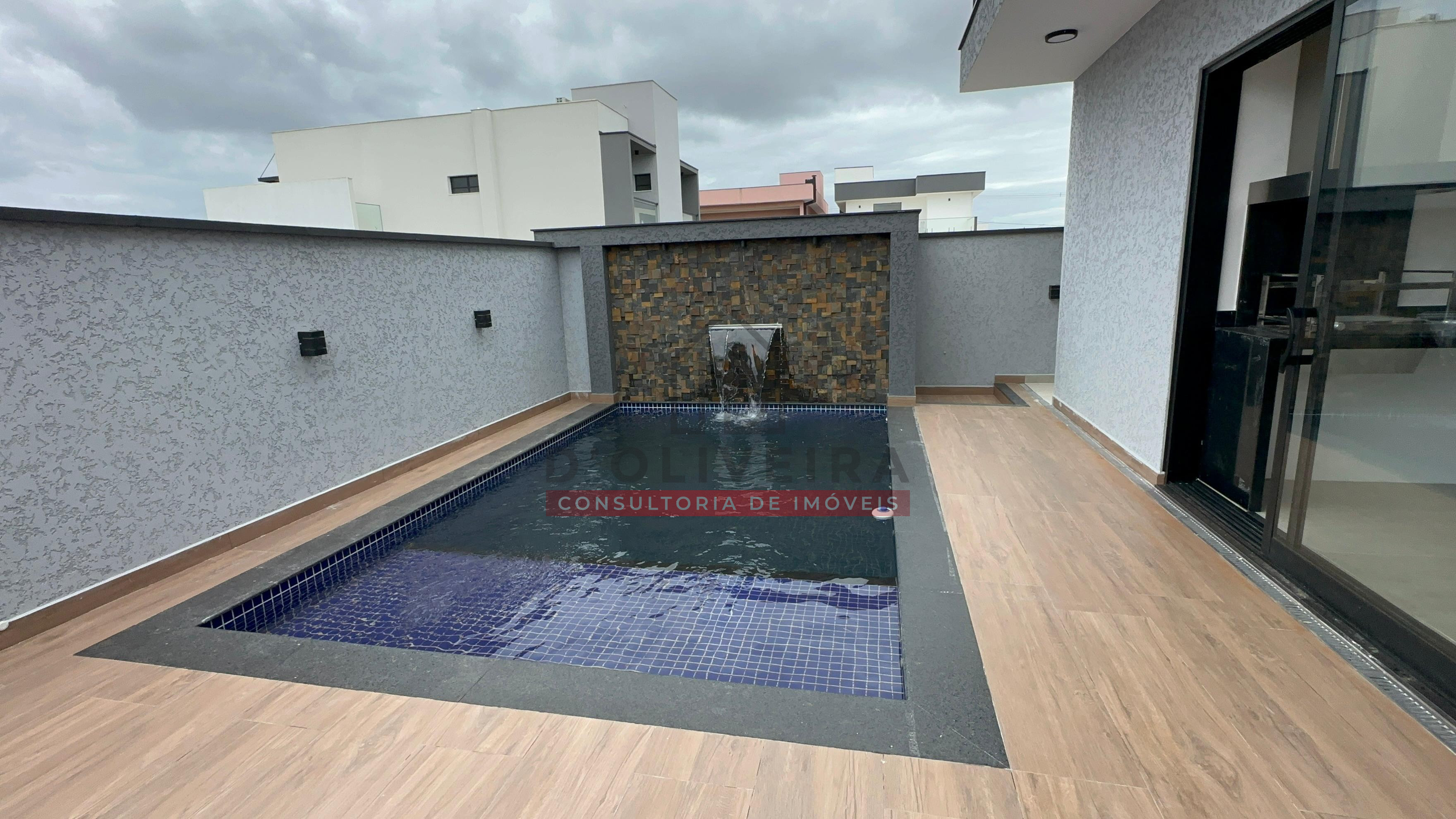 Sobrado com piscina e churrasqueira no condomínio Flora Rica - Peruíbe - SP