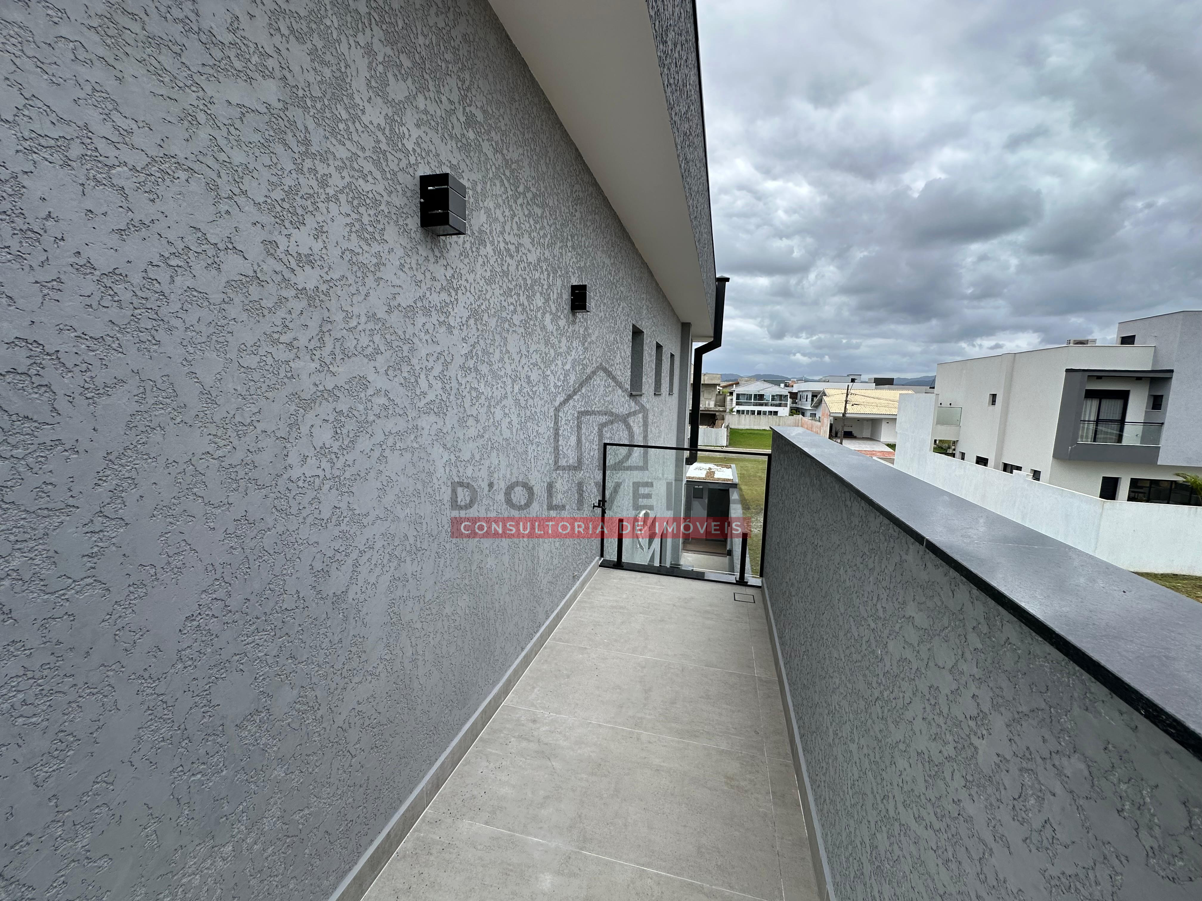 Sobrado com piscina e churrasqueira no condomínio Flora Rica - Peruíbe - SP