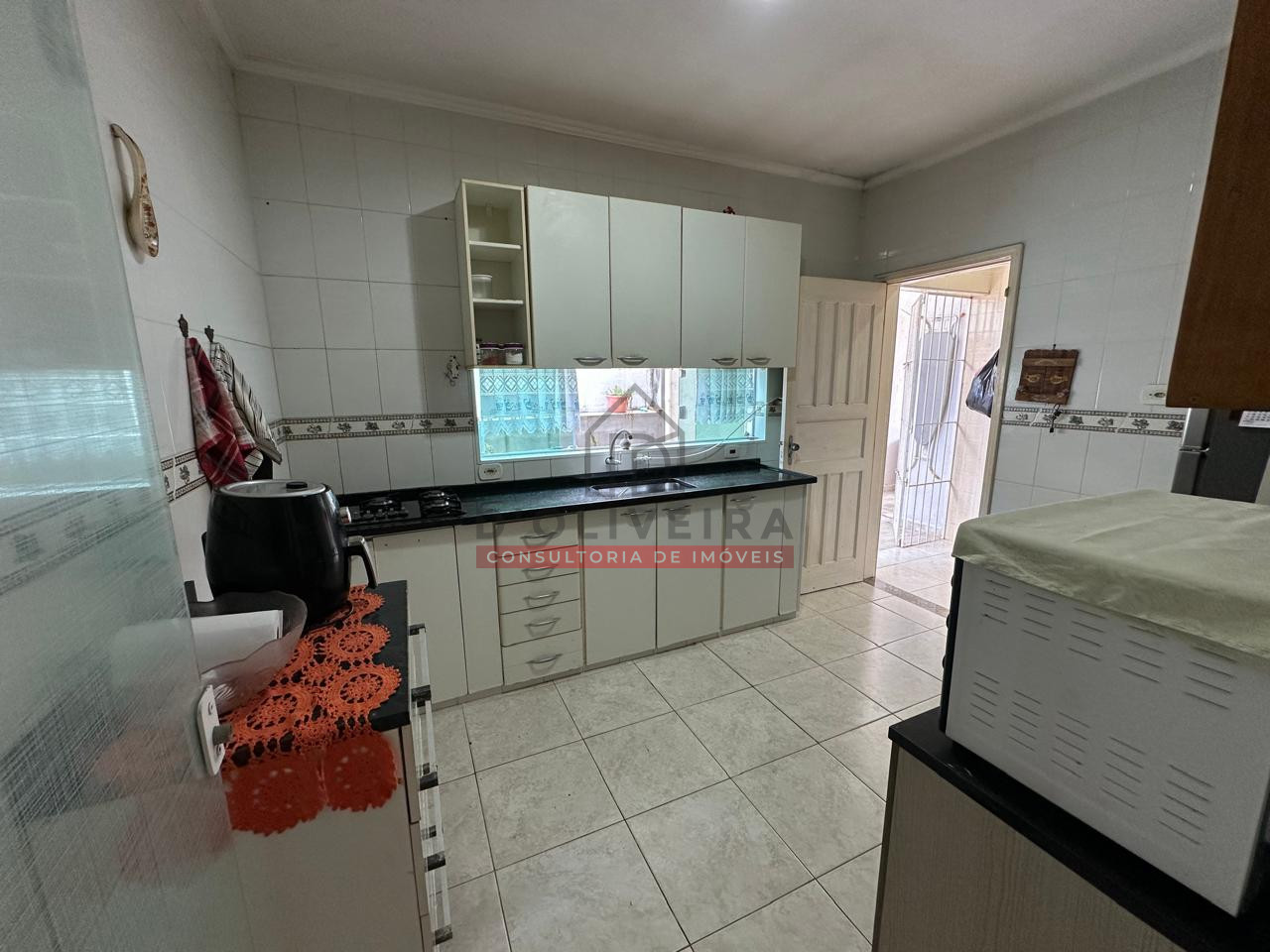 Casa com piscina e churrasqueira na Cidade Nova Peruíbe - Peruíbe - SP