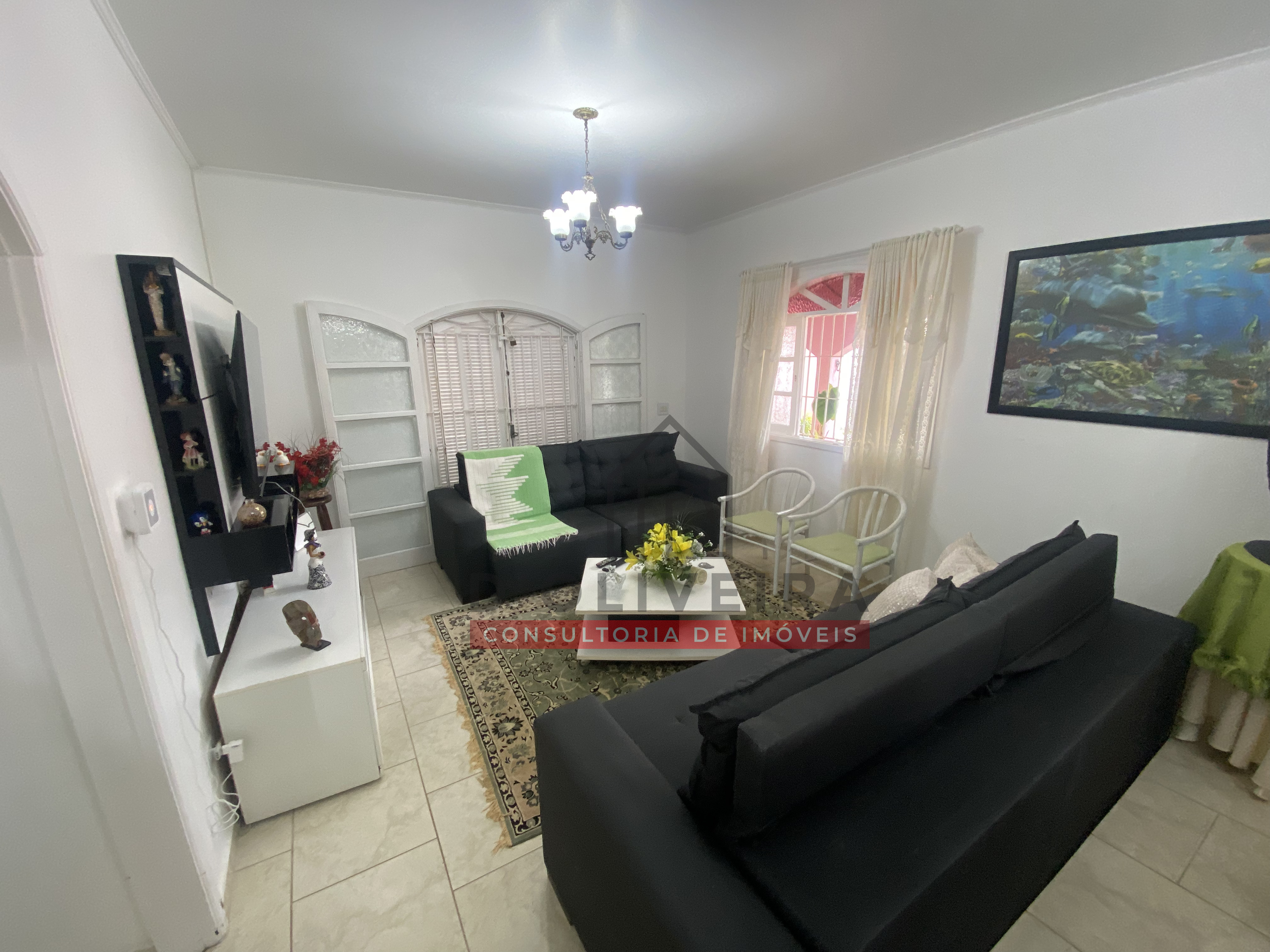 Casa com piscina e área gourmet à venda no Balneário Oásis - Peruíbe - SP